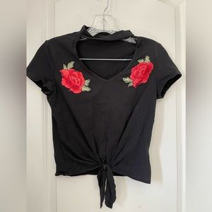 Black crop top with red roses size S. Very good condition. Gently used